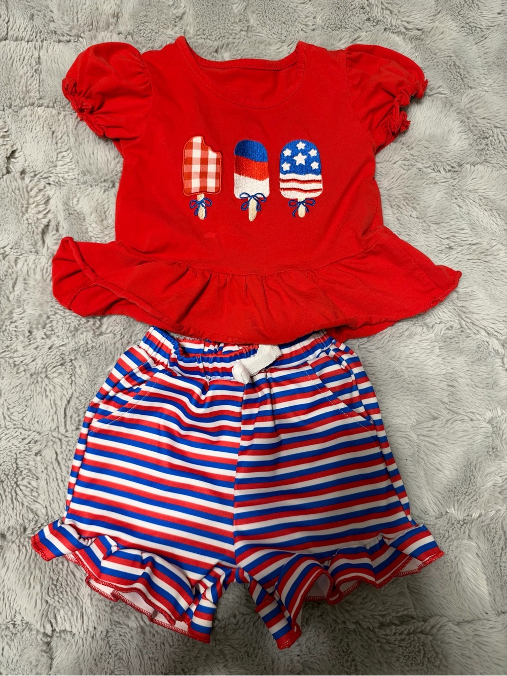 Amazon Red Top and Red-White-Blue Stripe Ruffle Shorts Set